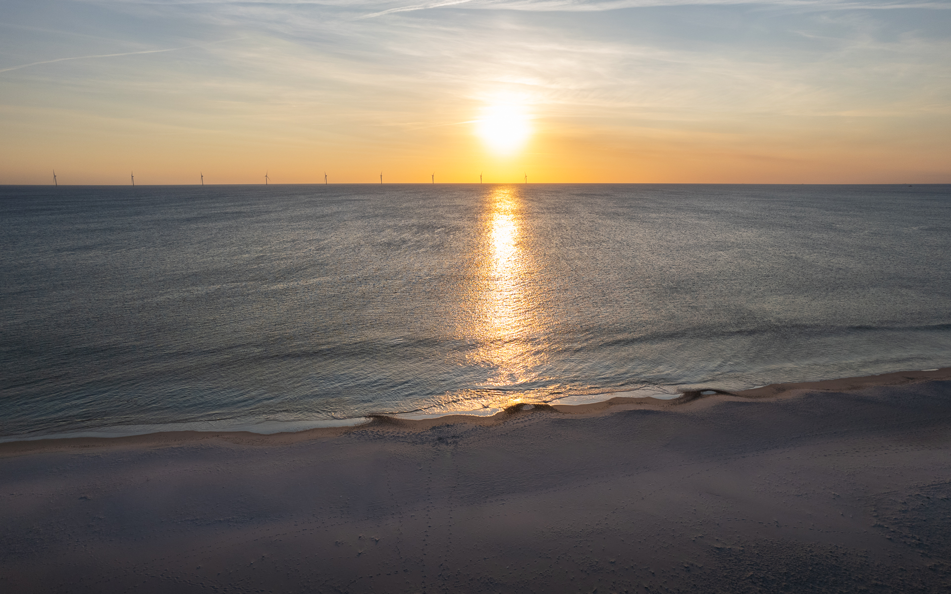 Bild: daenemark-meer-strand-sonnenuntergang-nordsee.jpg