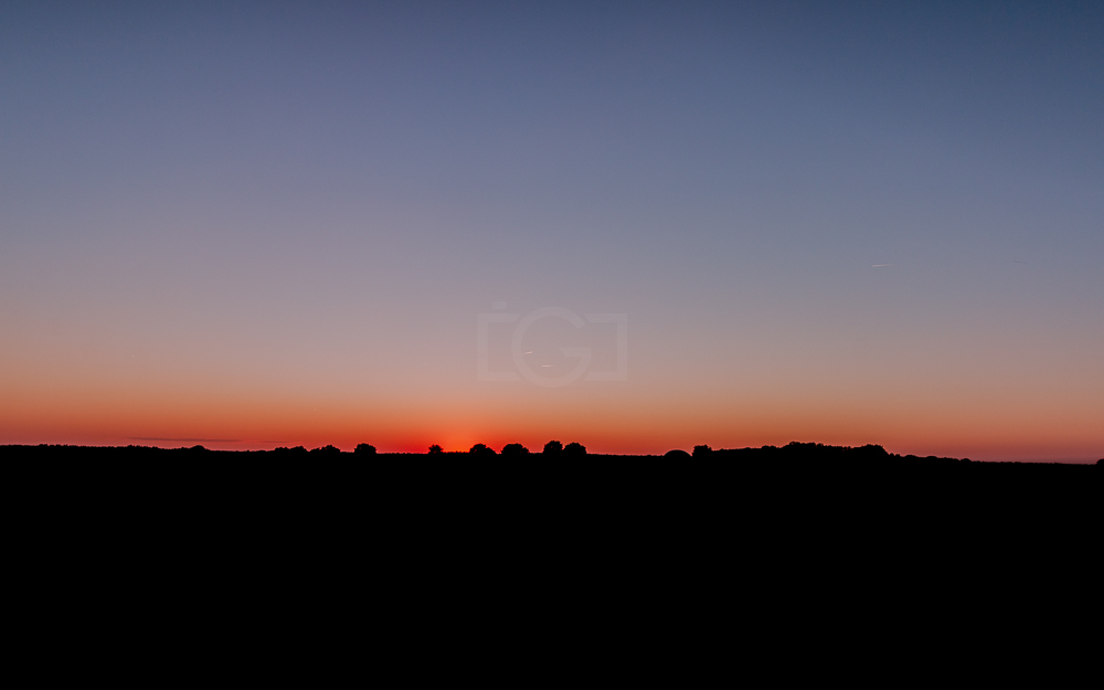 Bild: sonnenuntergang-silhouette-landschaft.jpg